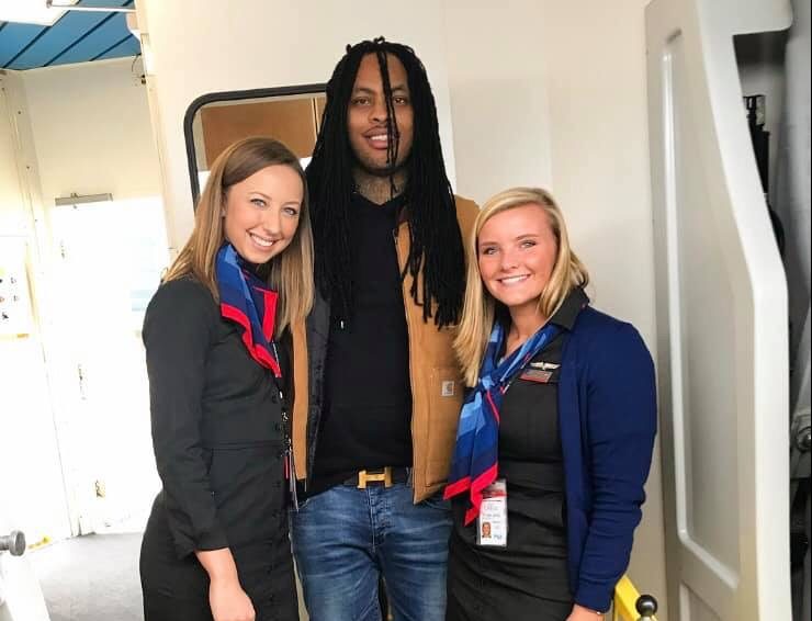Mattson (left) and her partner Kerr (right) with famous rapper Waka Flocka Flame on one of their recent flights.